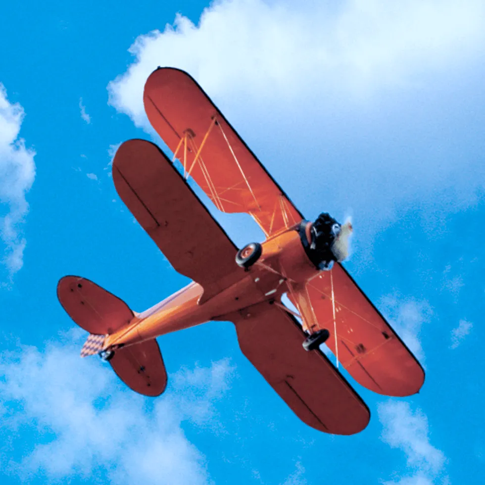 orange-aircraft-in-sky